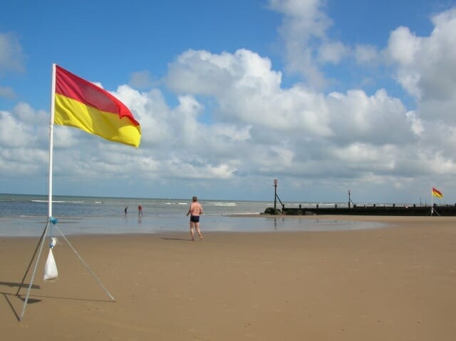 Red Over Yellow Beach Flag